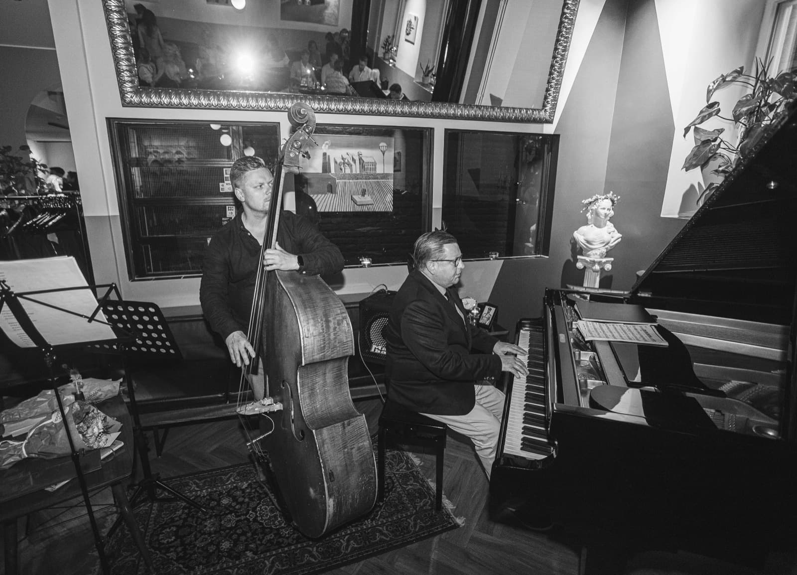 A pianist and double bassist performing live jazz at an Edna Social Club evening in Helsinki